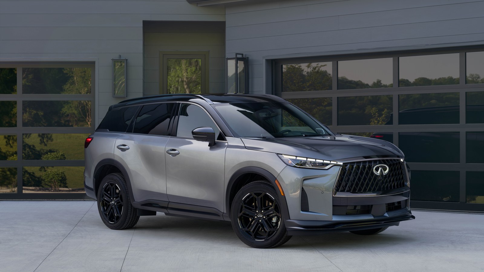 2027 INFINITI QX60 press photograph &mdash; front three-quarter view