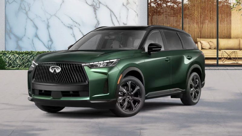 2027 INFINITI QX60 AUTOGRAPH in deep green with black roof and premium dark trim, front three-quarter view