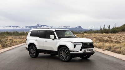 2026 Lexus GX 550 Luxury+ in Eminent White Pearl, front three-quarter against distant mountains