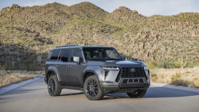 2026 Lexus GX 550 Premium in Nebula Gray, front three-quarter on a desert road