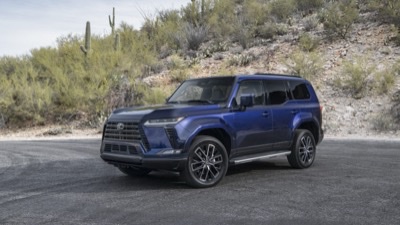 2026 Lexus GX 550 Premium+ in Nightfall Mica, front three-quarter on a desert pull-off