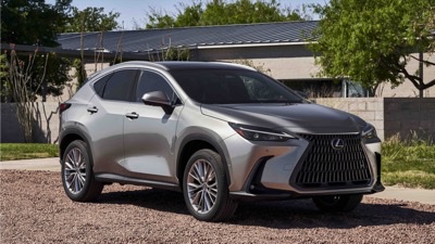 2026 Lexus NX 350 Luxury in silver, parked against modern architecture
