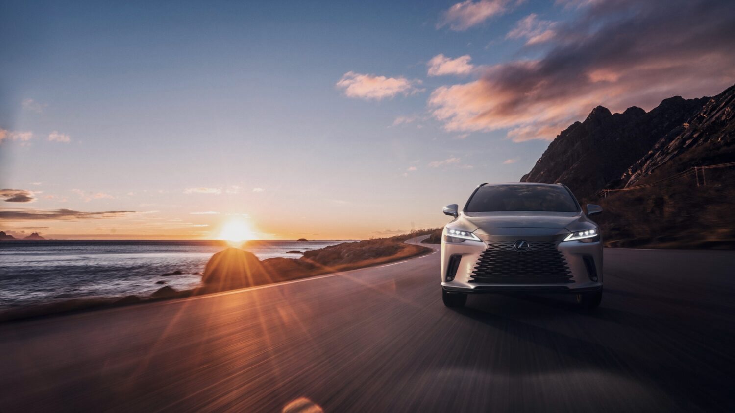 2026 Lexus RX 350 in motion on a coastal highway